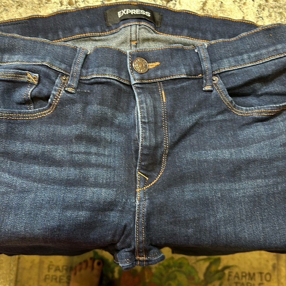 Express woman’s Legging mid rise jeans dark blue wash size12